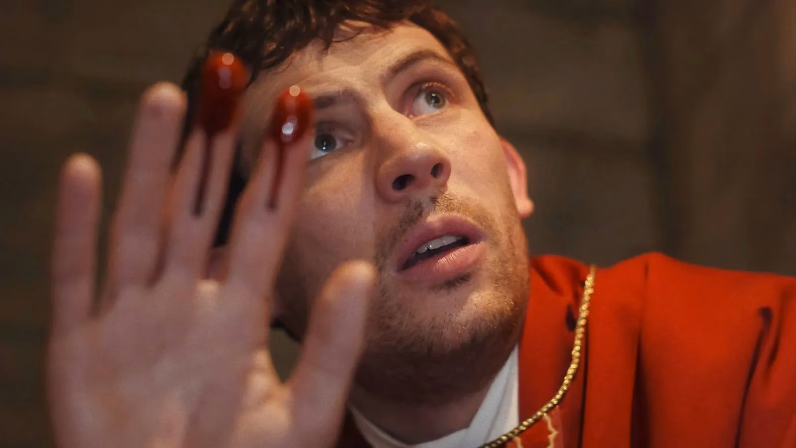 the-hidden-meaning-behind-josh-o-connor-s-tattoo-in-wake-up-dead-man-image-0